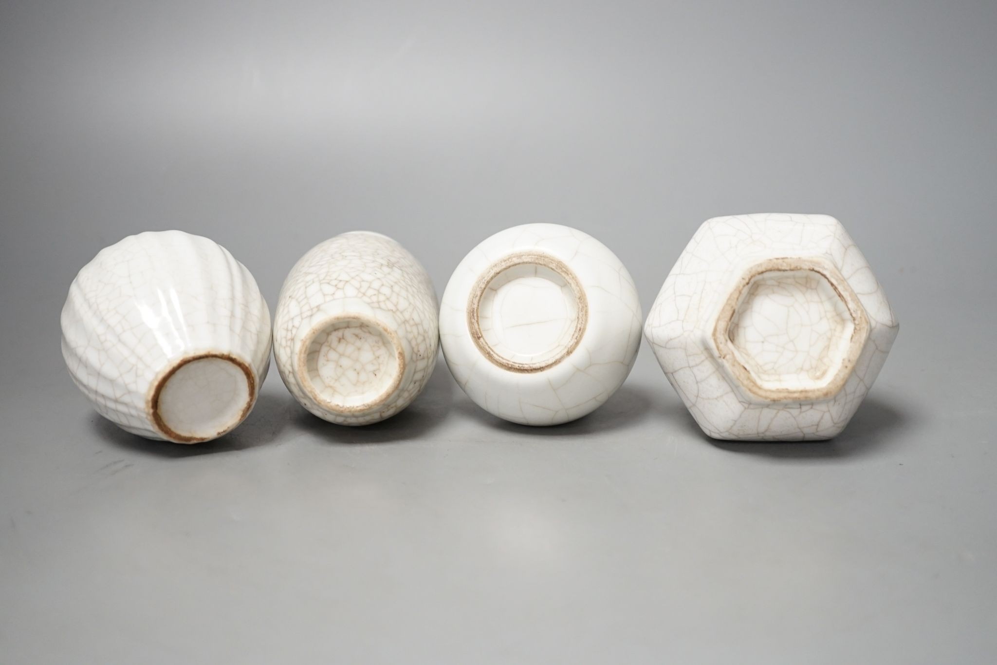 Four Chinese crackle glaze vases, tallest 16 cms high.